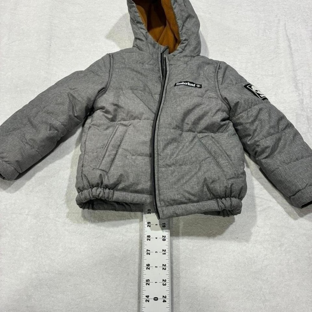 Grey Timberland kids size 4T puffer jacket with hood, warm and waterproof. SKU49